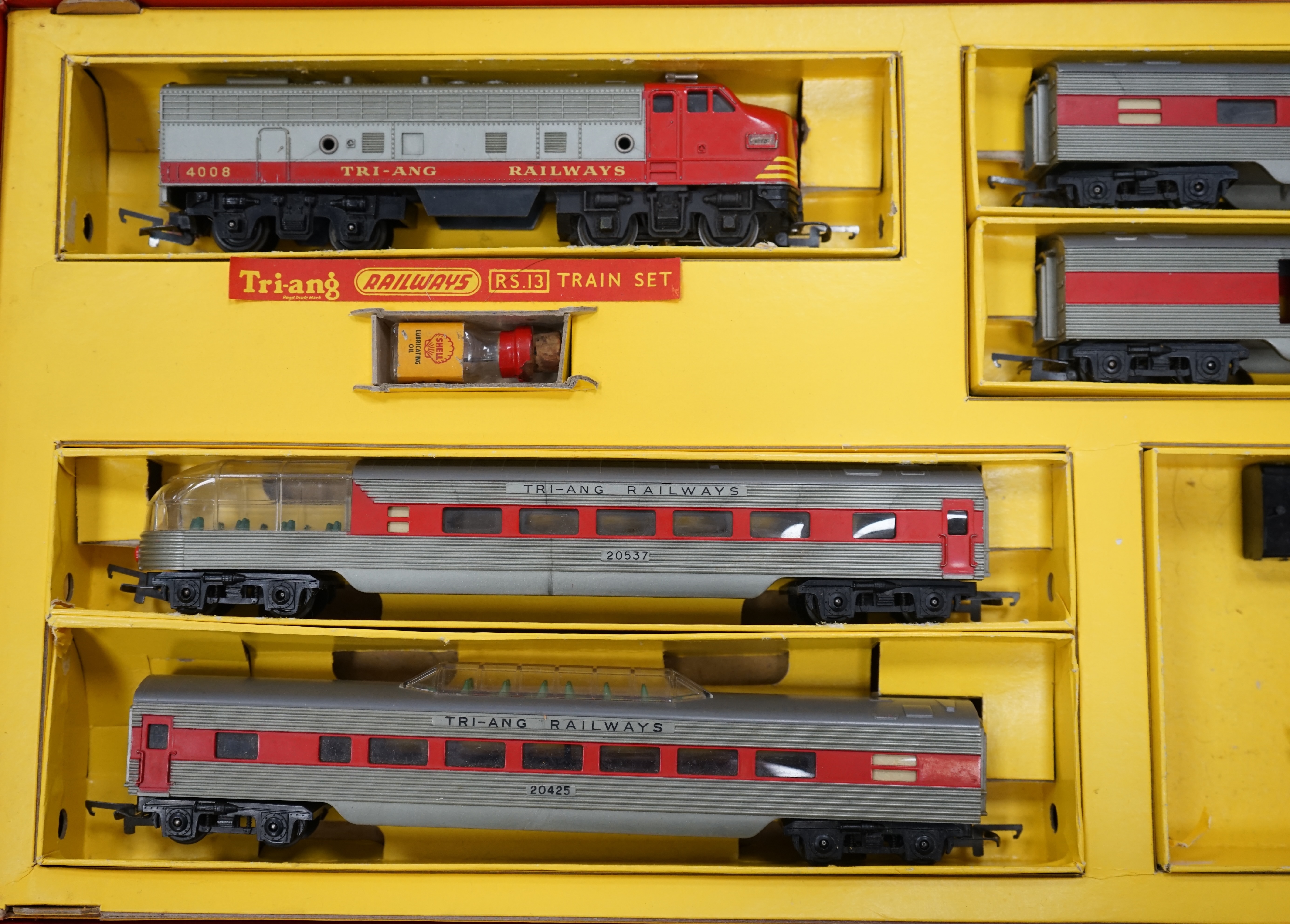 A collection of Hornby Dublo and Tri-ang Railways 00 gauge railway contained within two original boxes; a Hornby Dublo EDG17 Tank Goods Train B.R. set, contents include a BR Standard Class 4, 80054, fourteen tinplate fre